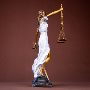 White finish Lady Justice Themis statue front full body view on warm brown background
