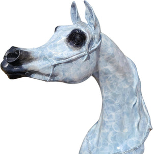 Close-up front detail of white patina bronze Arabian horse head sculpture showing textured mane and ears