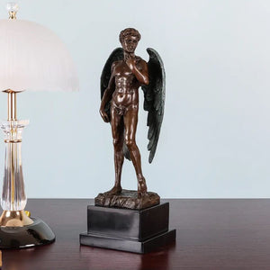 Front detail of winged David bronze statue showing muscular figure and outstretched wings