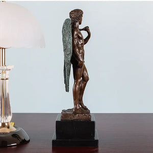 Right side view of winged David bronze statue on dark desk showing full marble base and wing detail