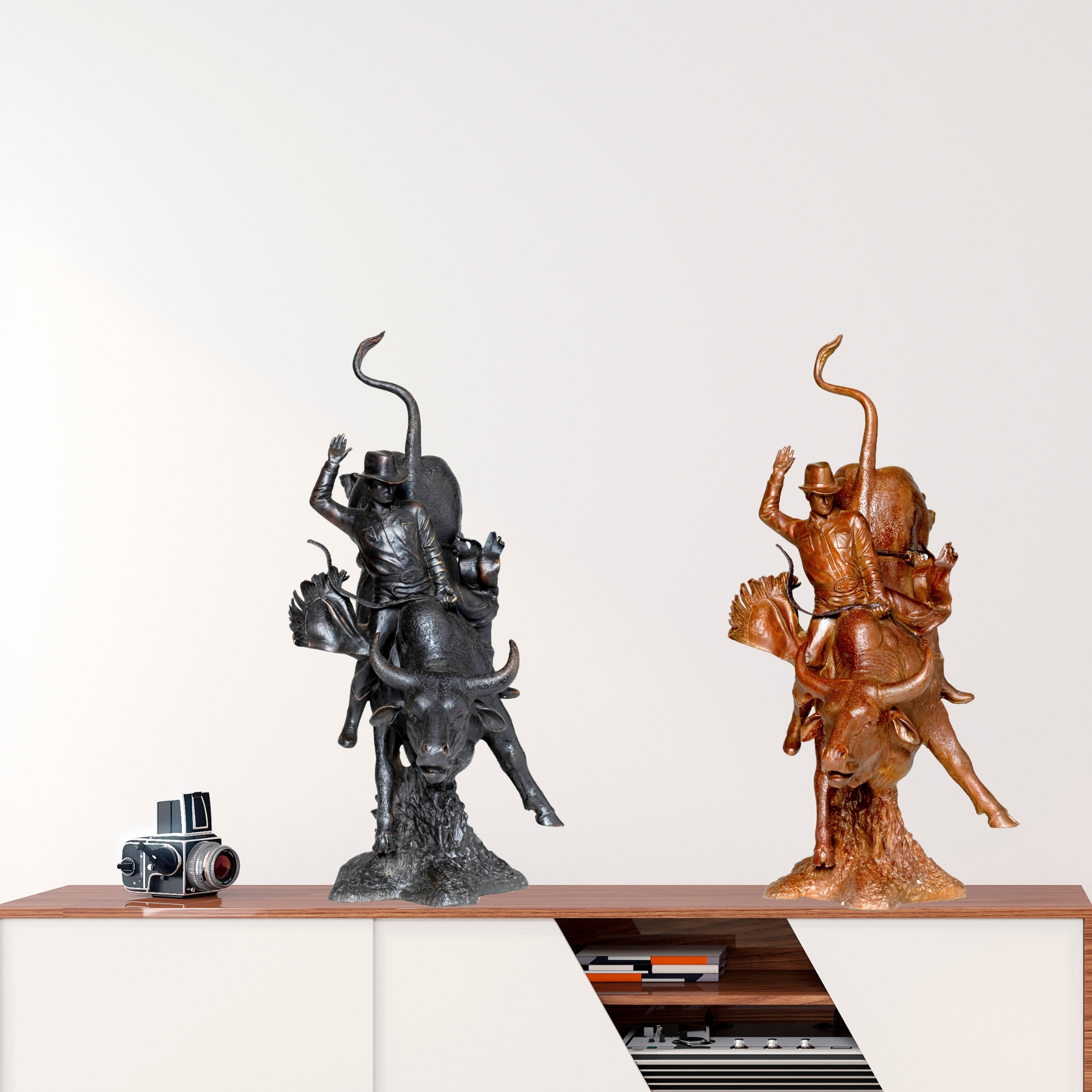Dynamic bronze bucking bull statues featuring a cowboy in a rodeo pose, handcrafted with the lost-wax process for rustic western home and office gallery decor.