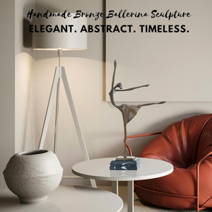 Elegant abstract timeless bronze ballerina dancer sculpture in modern interior living room setting