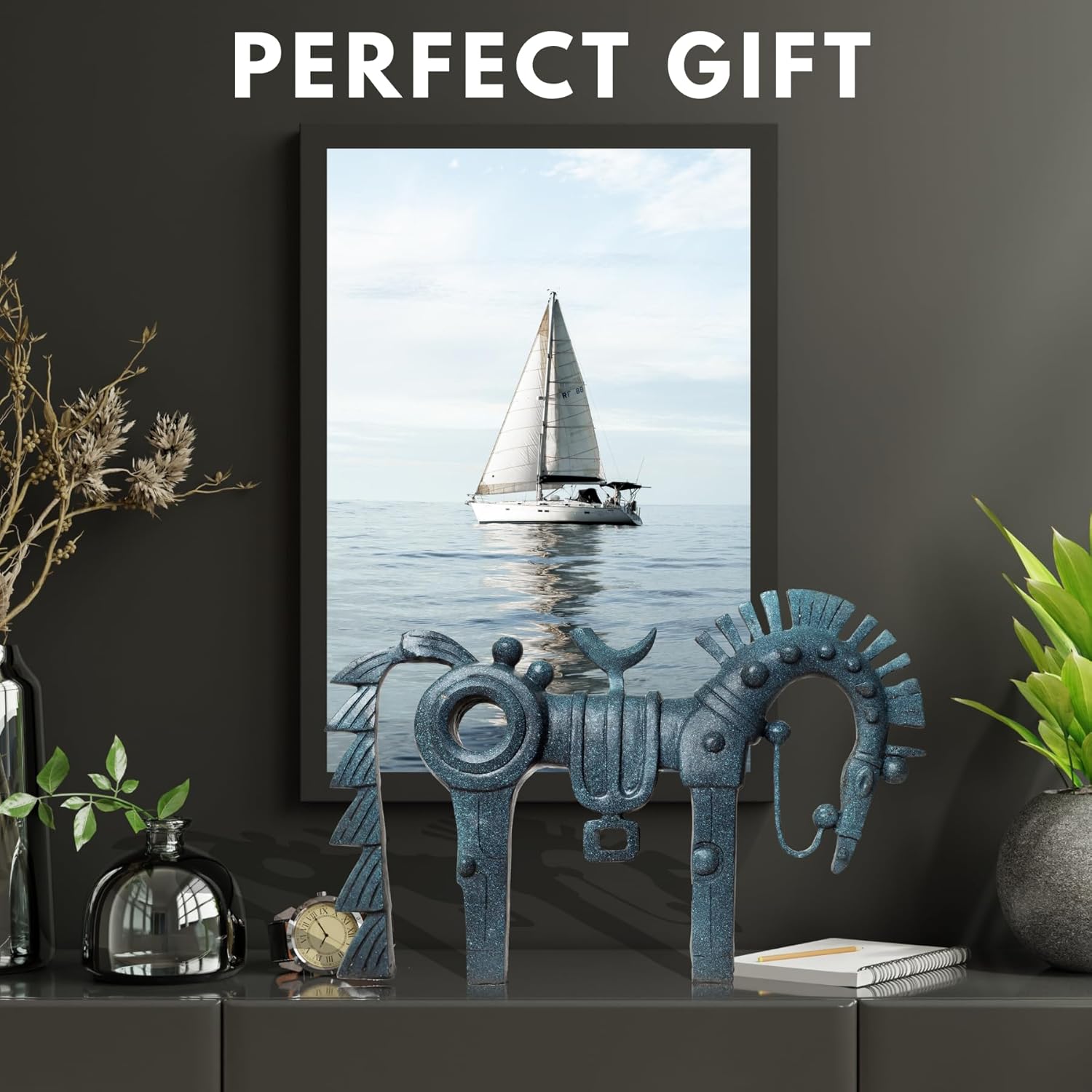 Abstract geometric bronze horse sculpture presented as perfect gift with sailboat artwork background