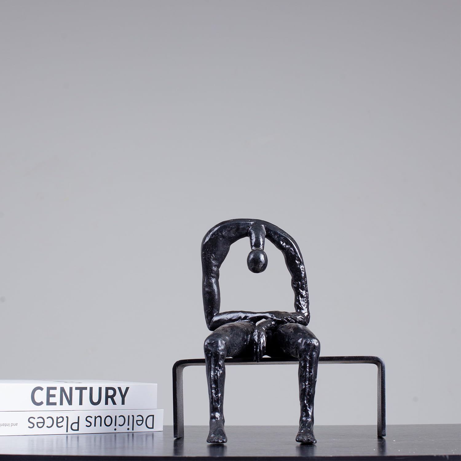 Albert György style melancholy man abstract bronze sculpture black finish full view
