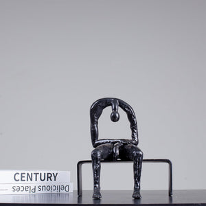 Albert György style melancholy man abstract bronze sculpture black finish full view