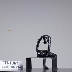 Albert György melancholy man bronze sculpture black finish three quarter angle