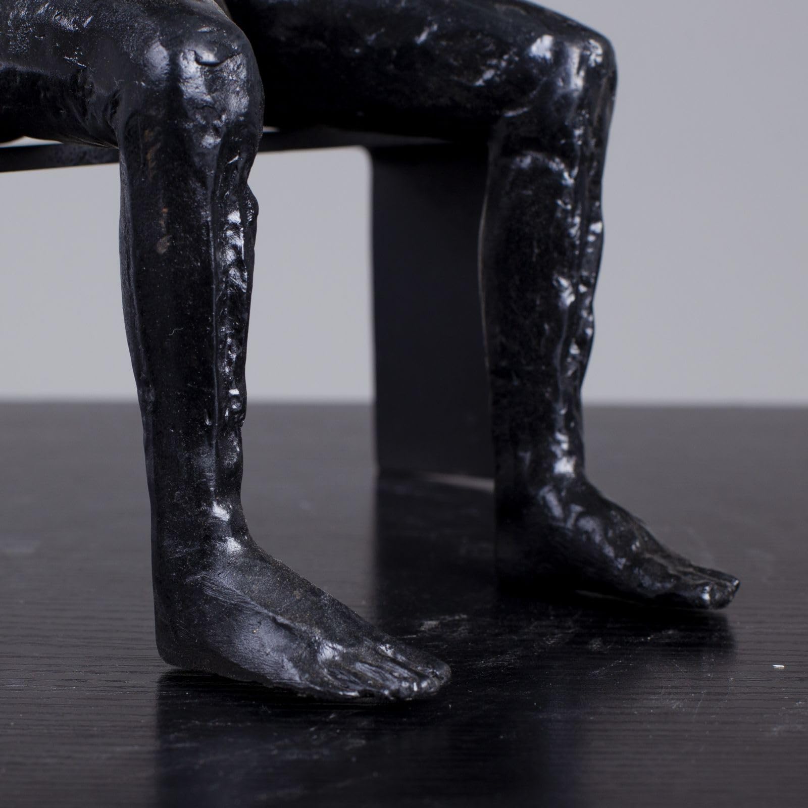Albert György melancholy man bronze sculpture leg and foot detail close up craftsmanship