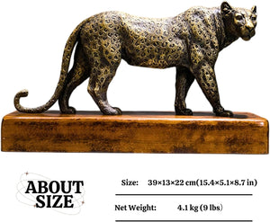 Antique bronze leopard sculpture side view with size and weight specification label on wood base