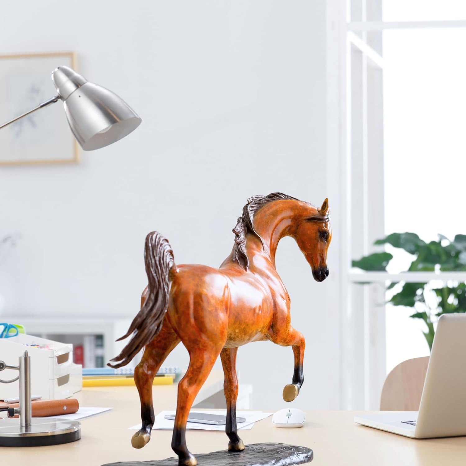 Close-up front view of Arabian horse bronze sculpture showing detailed head and stallion expression