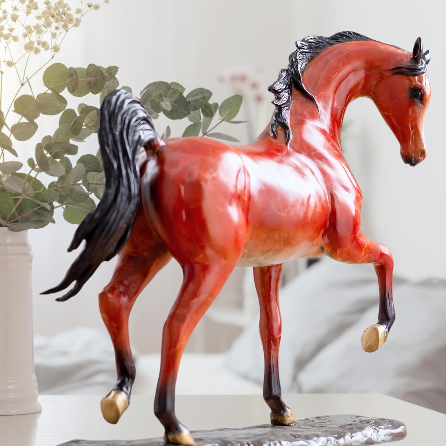 Arabian horse bronze sculpture left side view showing full stallion profile and flowing mane