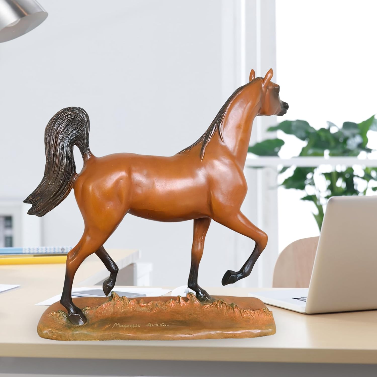 Arabian stallion bronze sculpture warm earth golden-brown finish left side view on terrain base