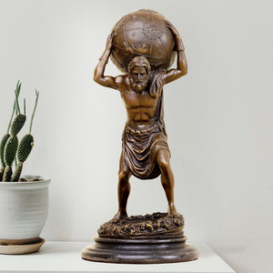 Greek Titan Atlas bronze sculpture antique gold finish carrying world full view beside plants