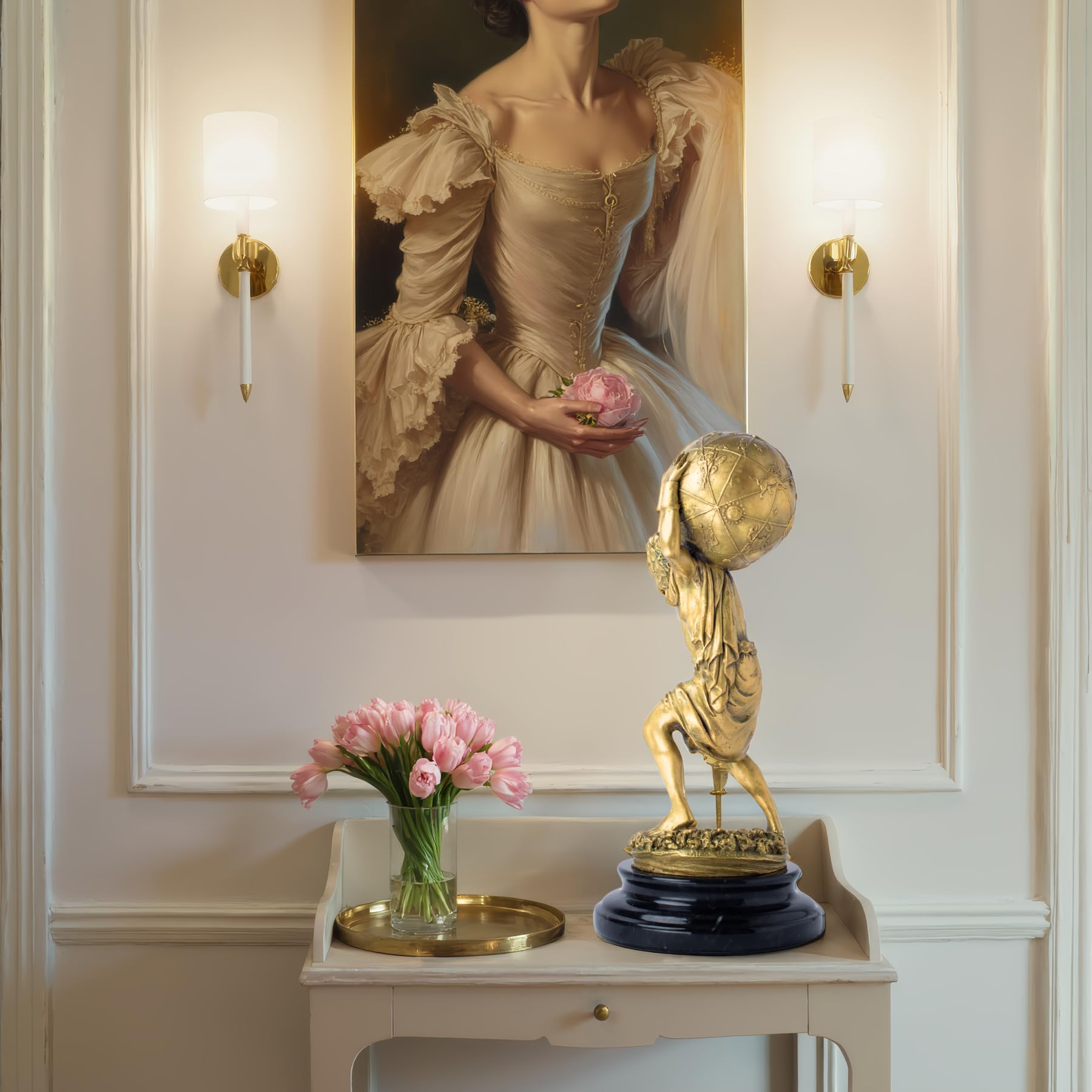 Atlas bronze sculpture gold finish entryway display beside wall light flowers