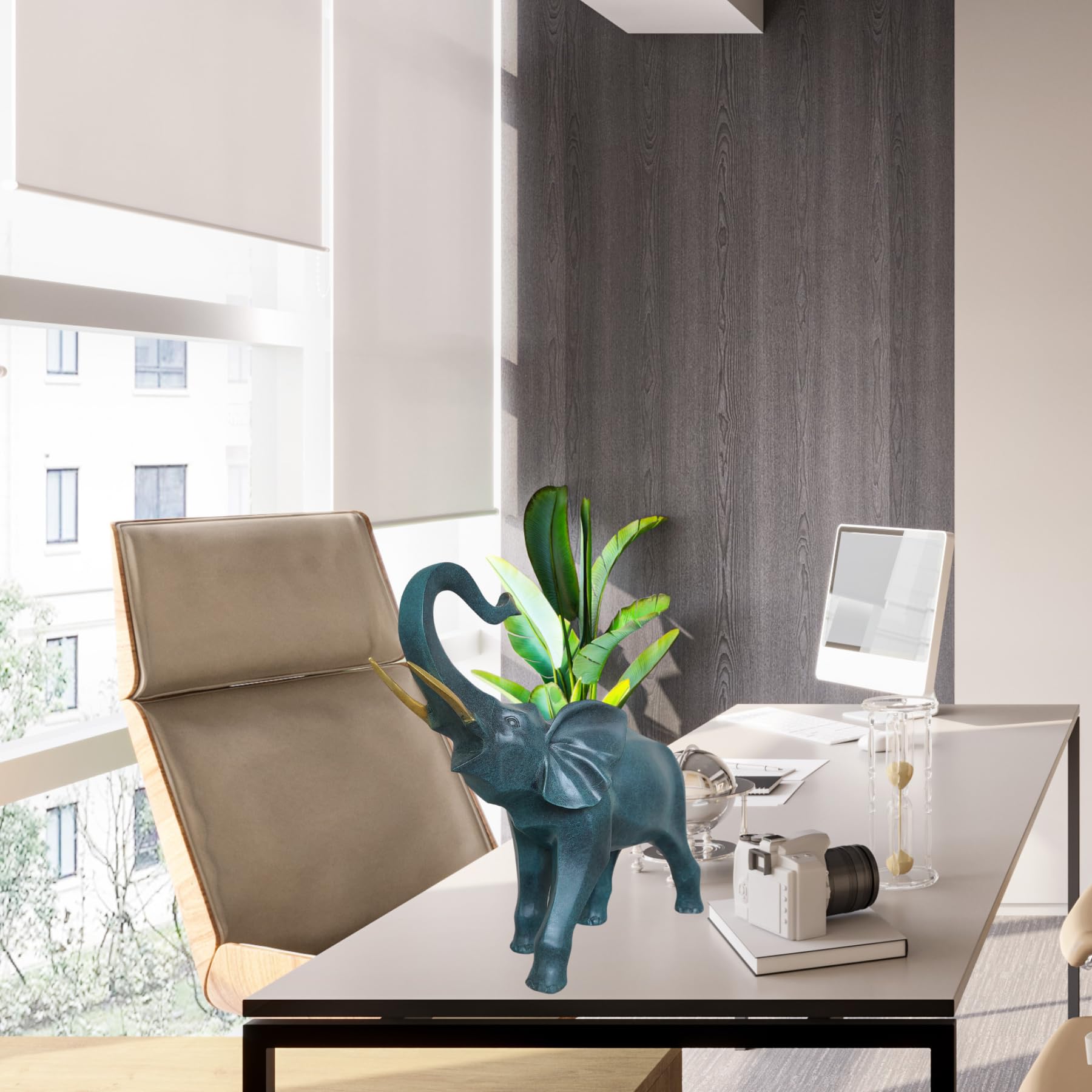 Blue bronze elephant statue placed in living room beside modern chair as nordic home decor