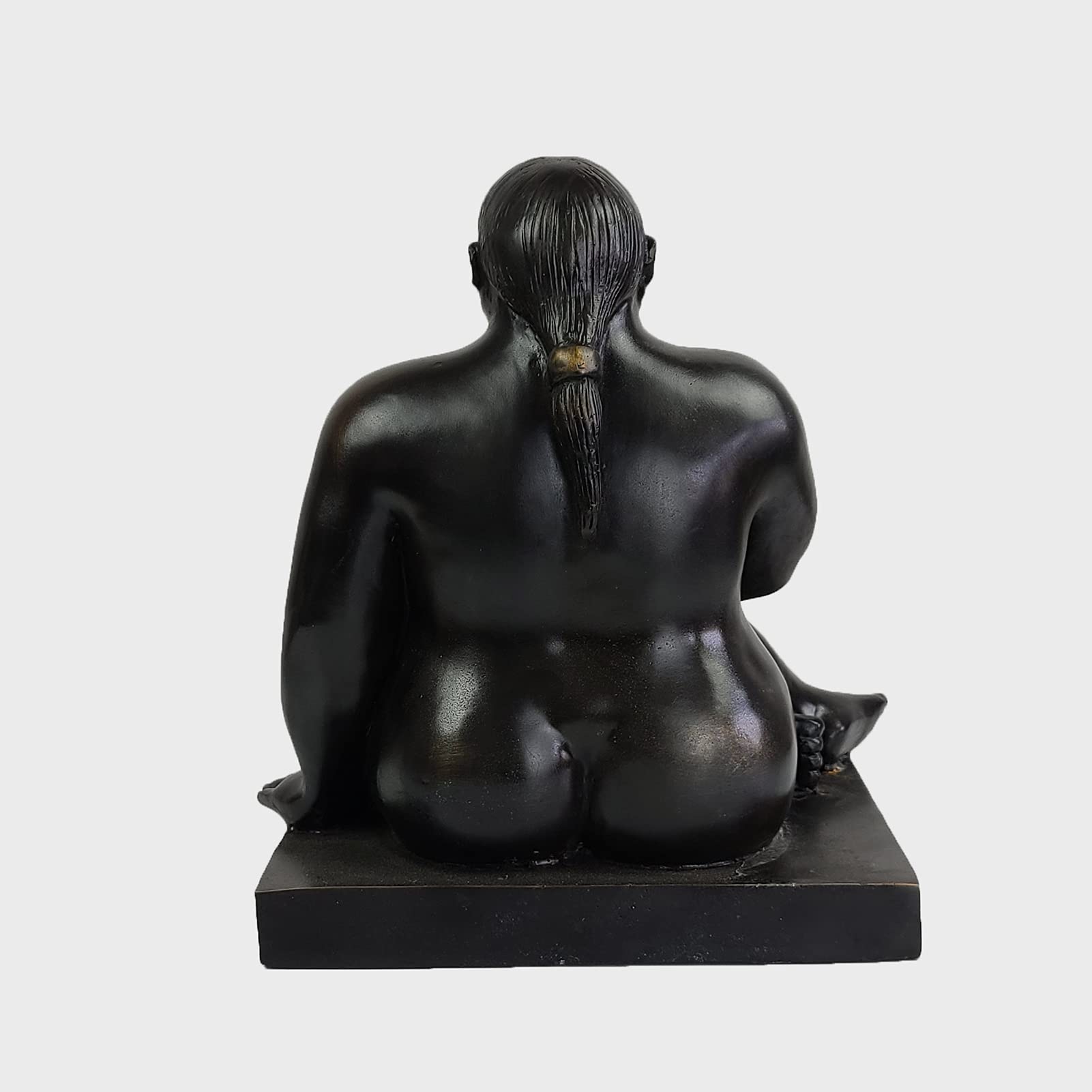 Botero bronze seated woman statue side profile voluptuous body detail
