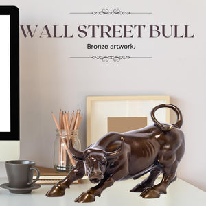 Classic brown brass bull statue styled on an executive desk.
