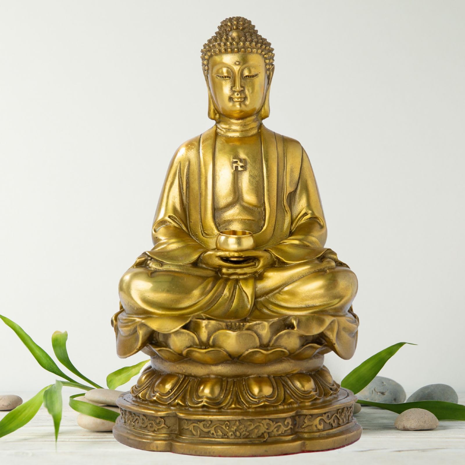 Brass meditating Buddha statue 7.87 inch front view on white background with lotus base and green leaf accent