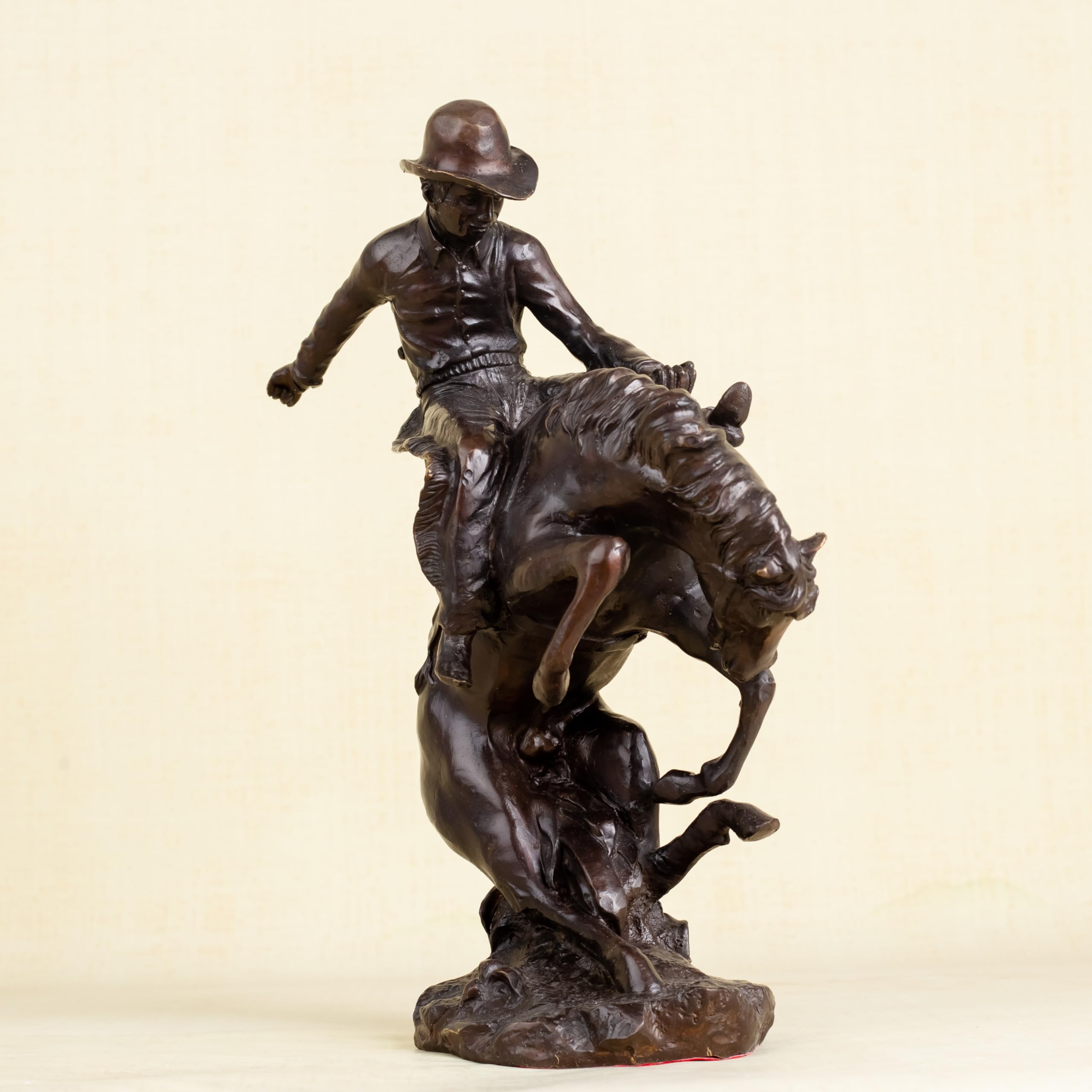 Rear left view of Style 3 Bronco Buster solid bronze sculpture showing horse detail
