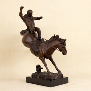 Large Bronco Buster bronze sculpture Style 5 – The Bucking Combat, intense vertical bucking action front view