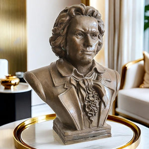 Bronze Beethoven bust statue displayed on gold side table in lifestyle setting