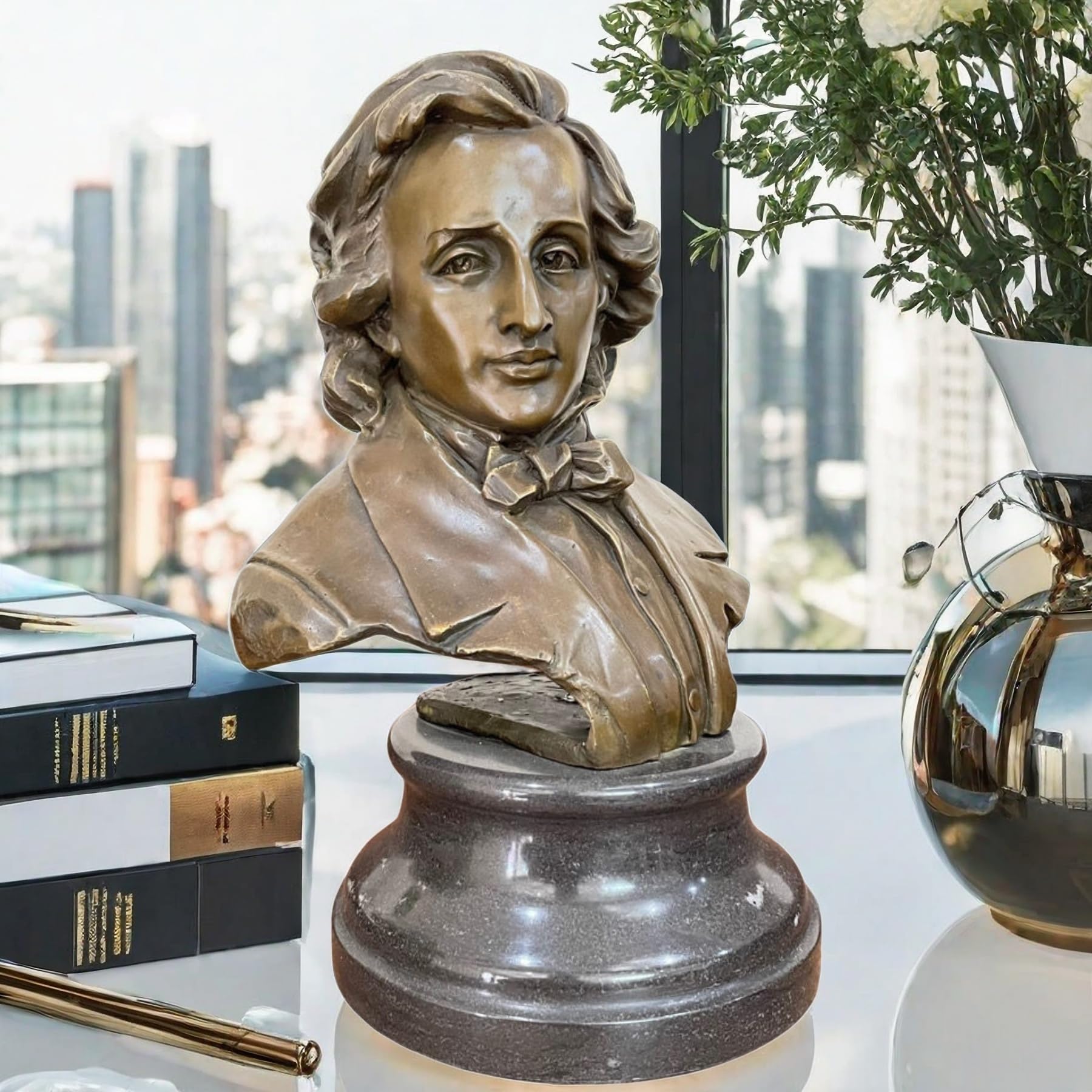 Bronze Frédéric Chopin bust statue on marble base displayed by highrise city window