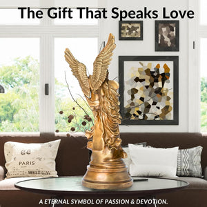 Bronze Cupid Psyche sculpture displayed on console beside pink candles romantic interior