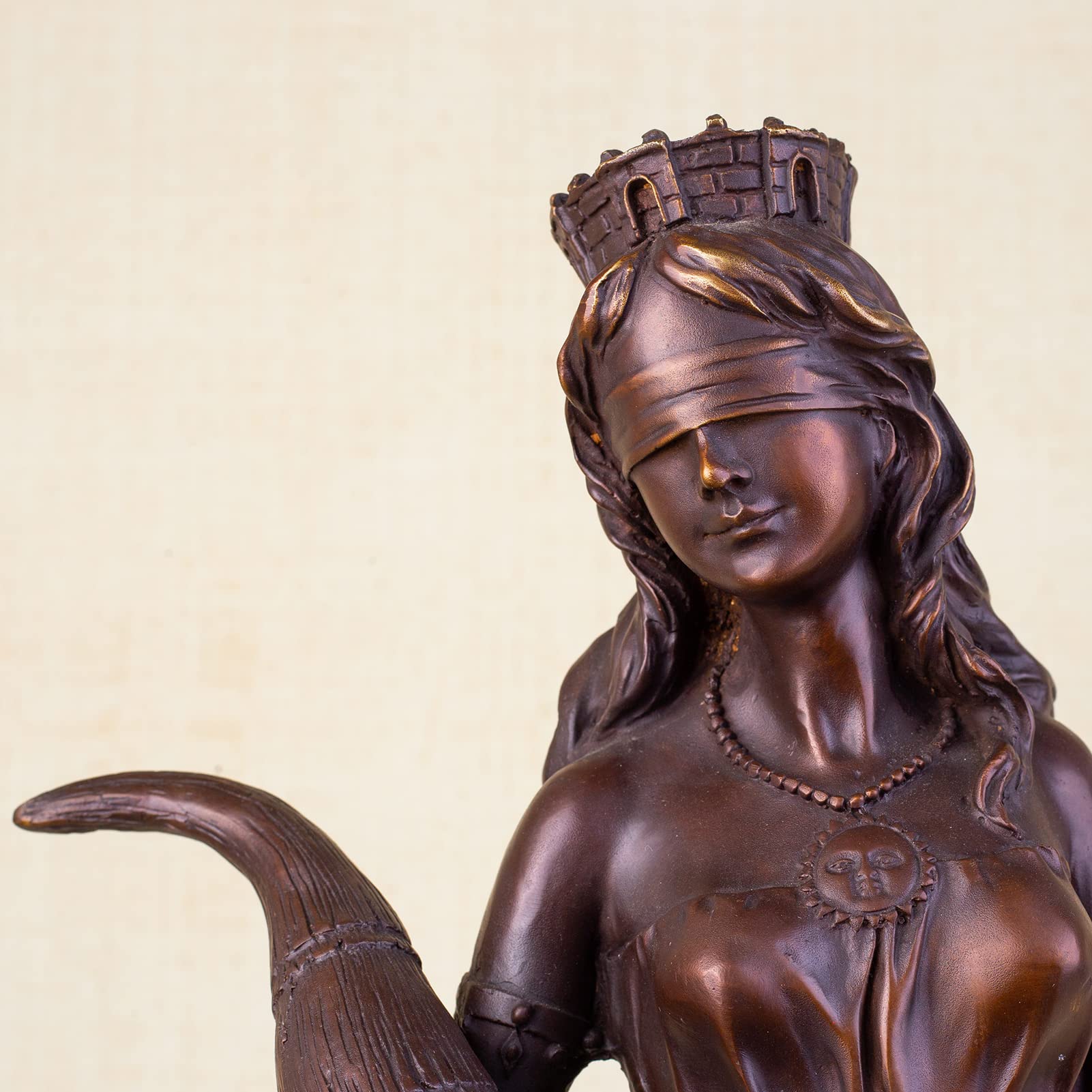 Bronze Fortuna goddess wealth statue cornucopia and hand detail close up