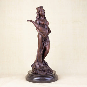 Bronze Fortuna goddess wealth statue face crown and blindfold detail close up