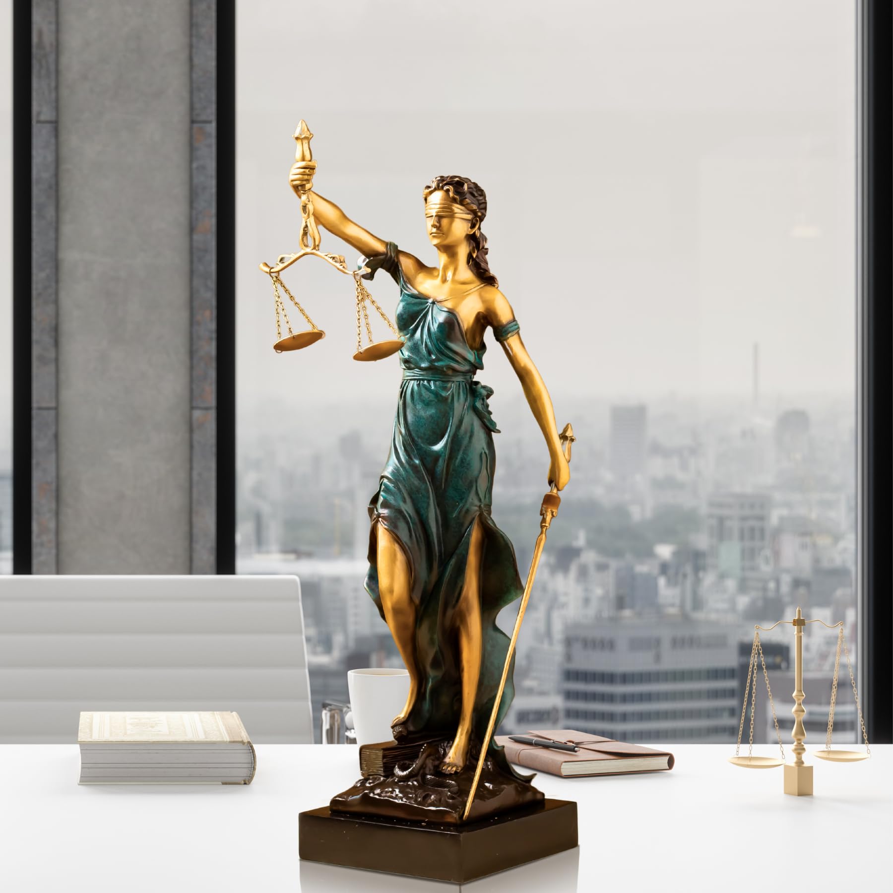 19.3-inch teal bronze Lady Justice Themis statue displayed in highrise office with city window view