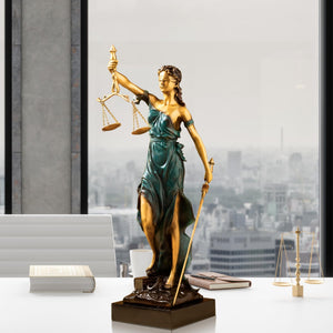 19.3-inch teal bronze Lady Justice Themis statue displayed in highrise office with city window view