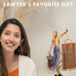 Bronze Lady Justice Themis statue on female lawyer office desk in law firm office decoration setting