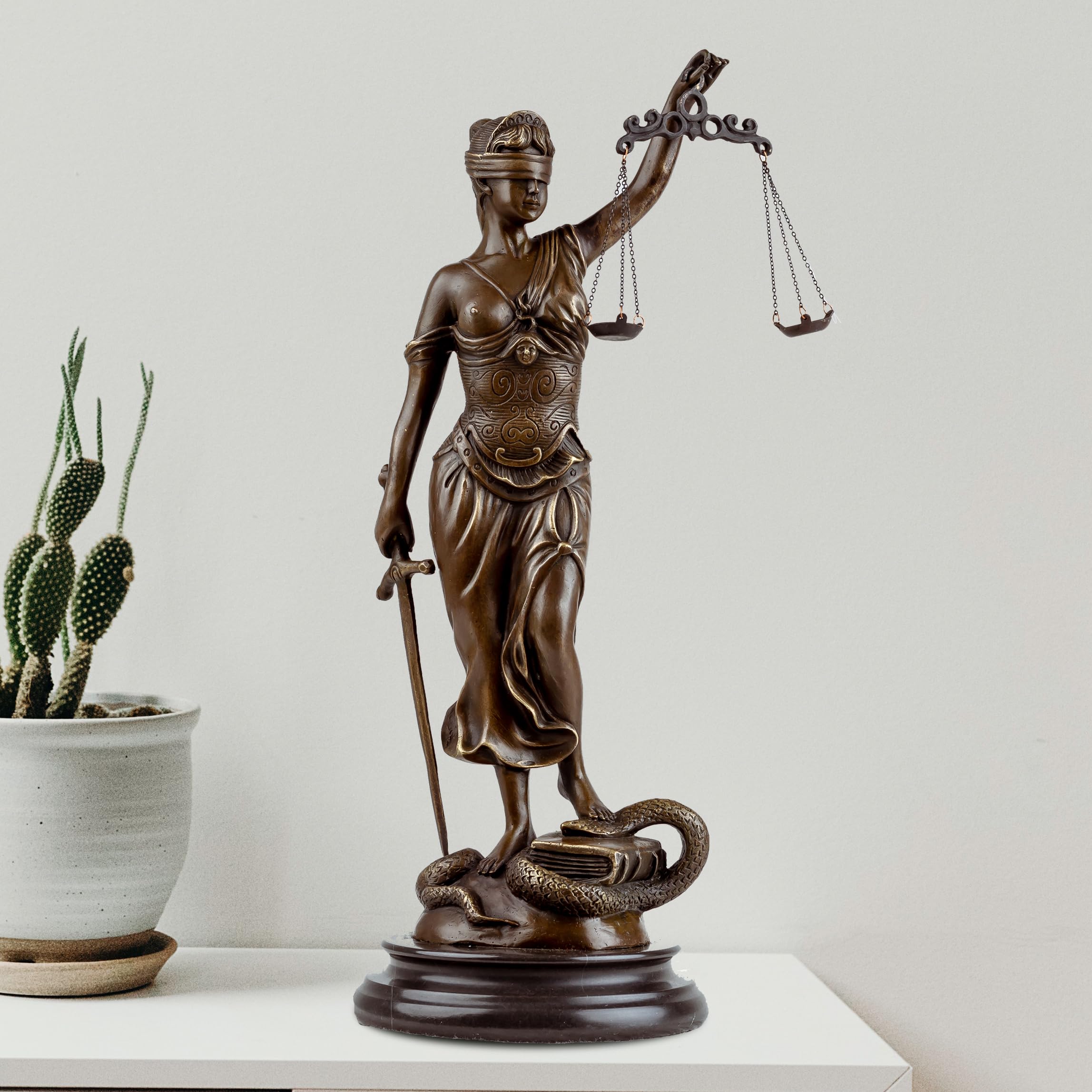 Bronze Lady Justice Themis statue front full body view on white background showing scales and sword detail