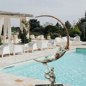 Bronze mermaid crescent moon sculpture pool garden outdoor display palm trees