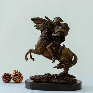 Bronze Napoleon Crossing the Alps statue on rearing horse with marble base, side front view with decorative pinecones