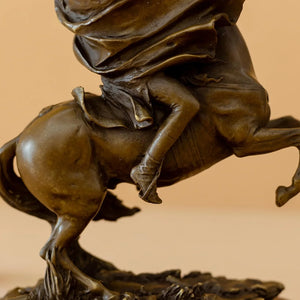Full body side view of bronze Napoleon Crossing the Alps rearing horse statue on marble base