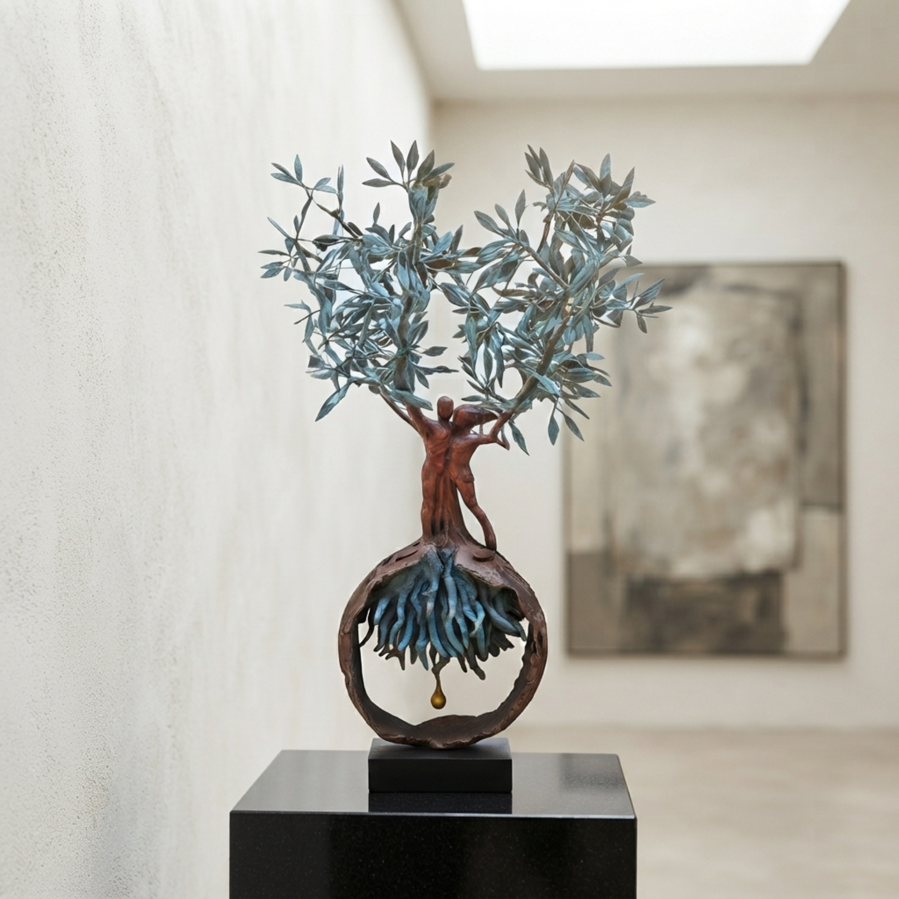 The 1.2-meter-tall handcrafted bronze olive tree and embracing couple sculpture placed on a sleek black display pedestal inside a minimalist art gallery with soft natural lighting and concrete walls.
