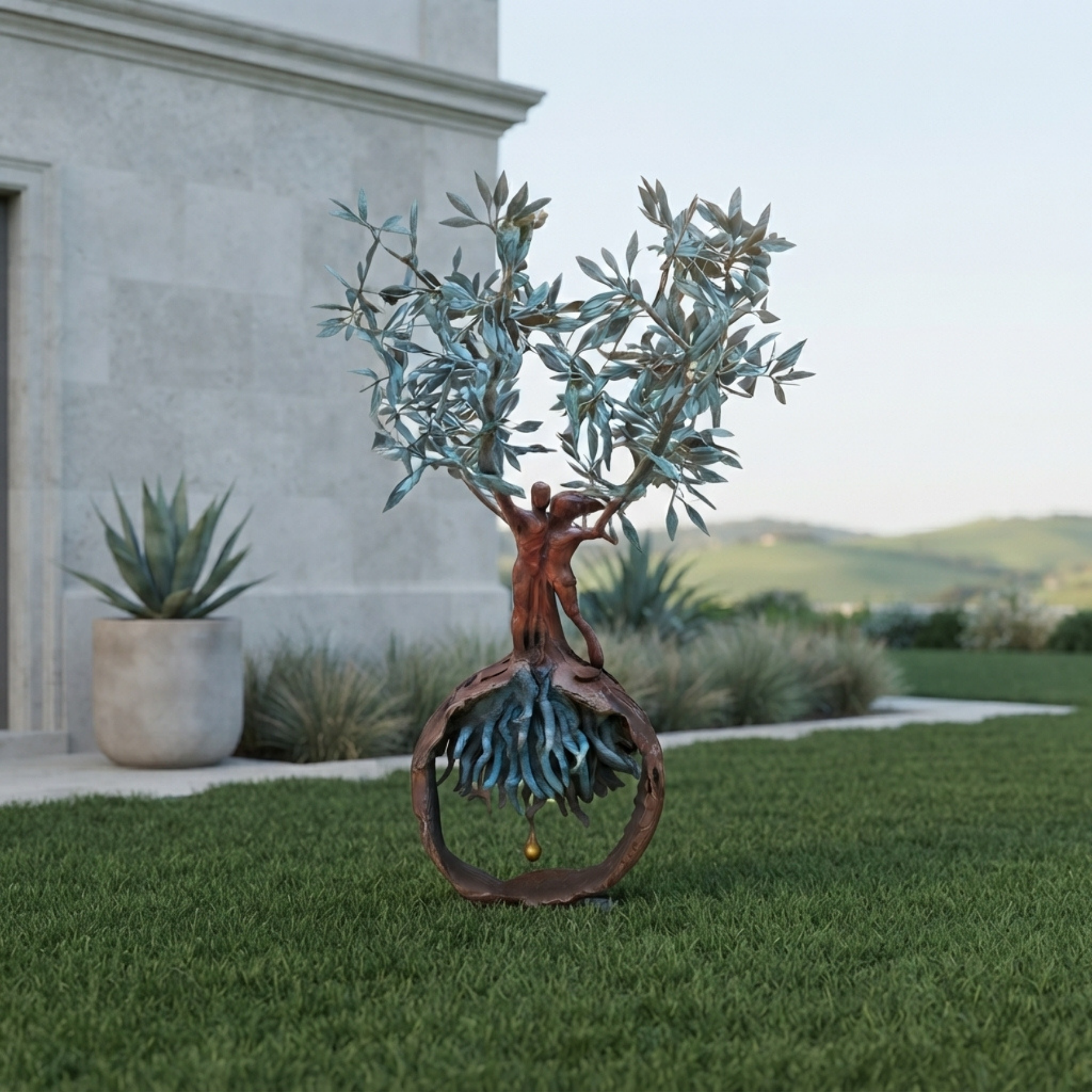 The 1.2-meter-tall handcrafted bronze olive tree and embracing couple sculpture standing on a manicured green lawn outside a modern luxury villa with clean stone facades and distant rolling hills.