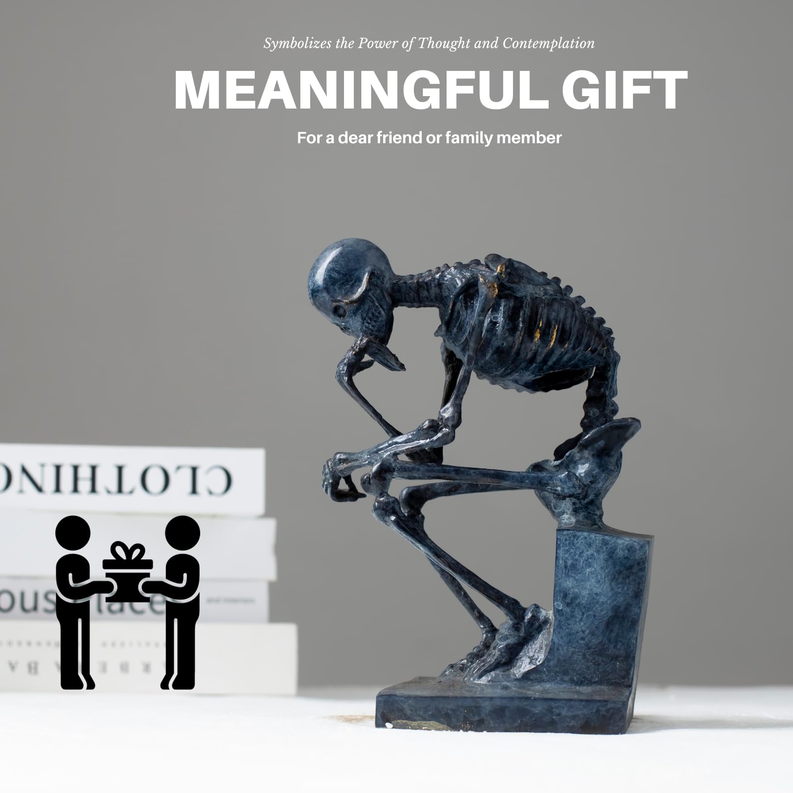 Bronze skeleton Thinker statue meaningful gift feature beside family figurine on stairs
