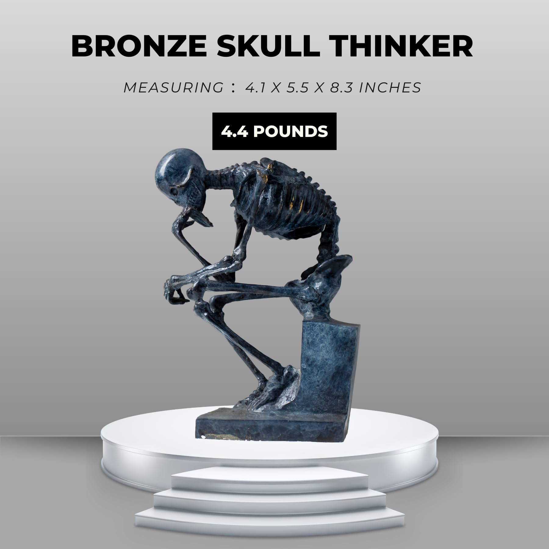 Bronze skeleton Thinker statue in blue-grey patina modern sculpture feature card on pedestal display