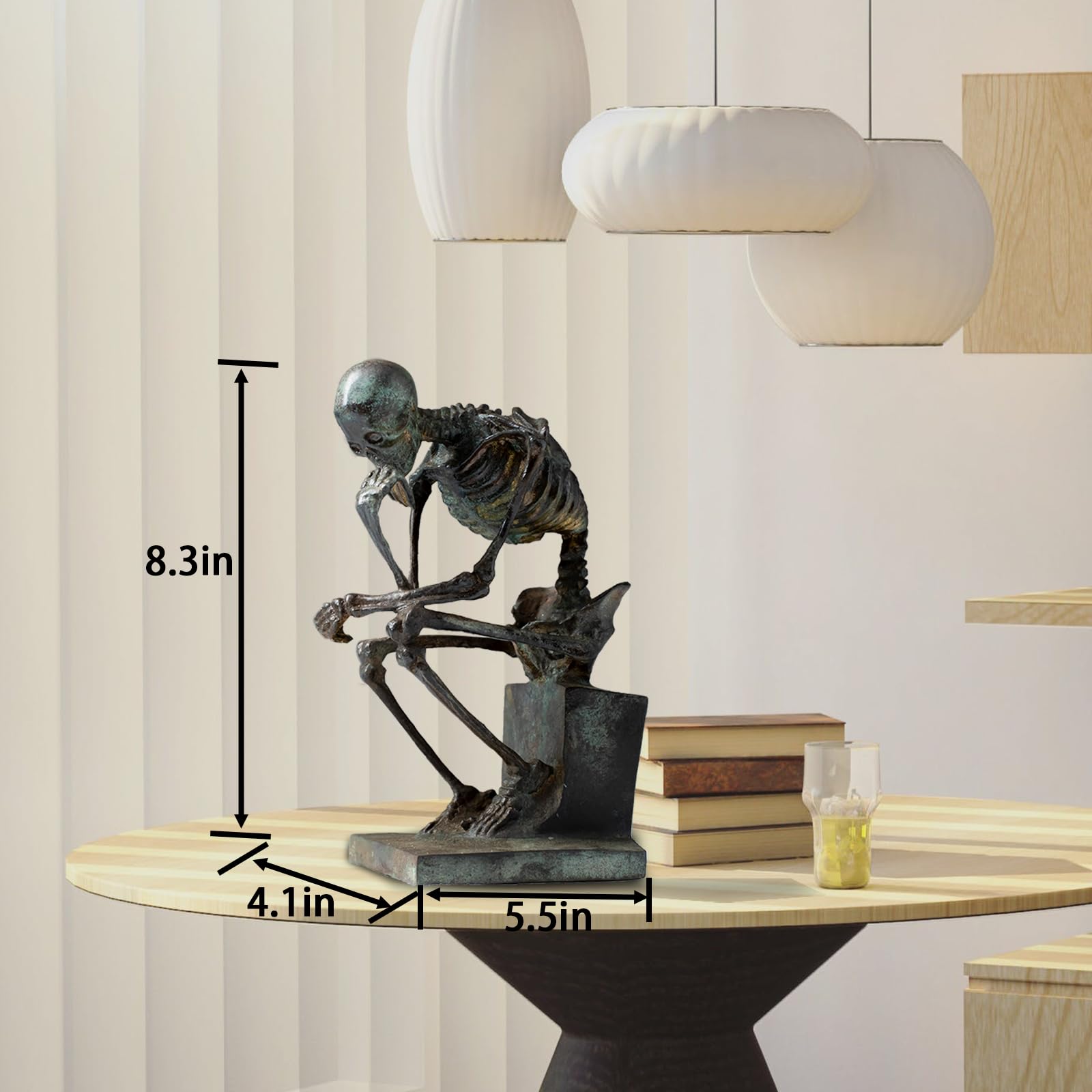 Bronze skeleton Thinker statue in green finish on desk with size dimension reference