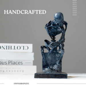 Bronze skeleton Thinker statue traditional techniques feature card showing craftsmanship detail