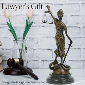 Bronze Themis Lady Justice statue styled as lawyer gift in lifestyle setting with floral arrangement