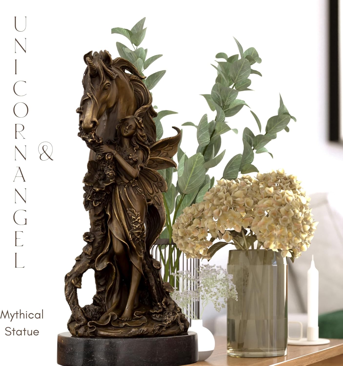 Bronze unicorn angel sculpture displayed alongside indoor plants as home décor accent