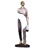 Front view of Bruno Catalano inspired traveler bronze sculpture with rose gold jacket.