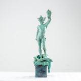 Angled view of Perseus Medusa green bronze sculpture showing mythological figure detail