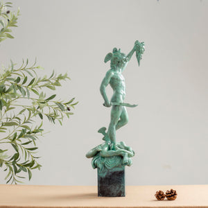 Benvenuto Cellini Perseus holding Medusa head bronze sculpture green patina front view