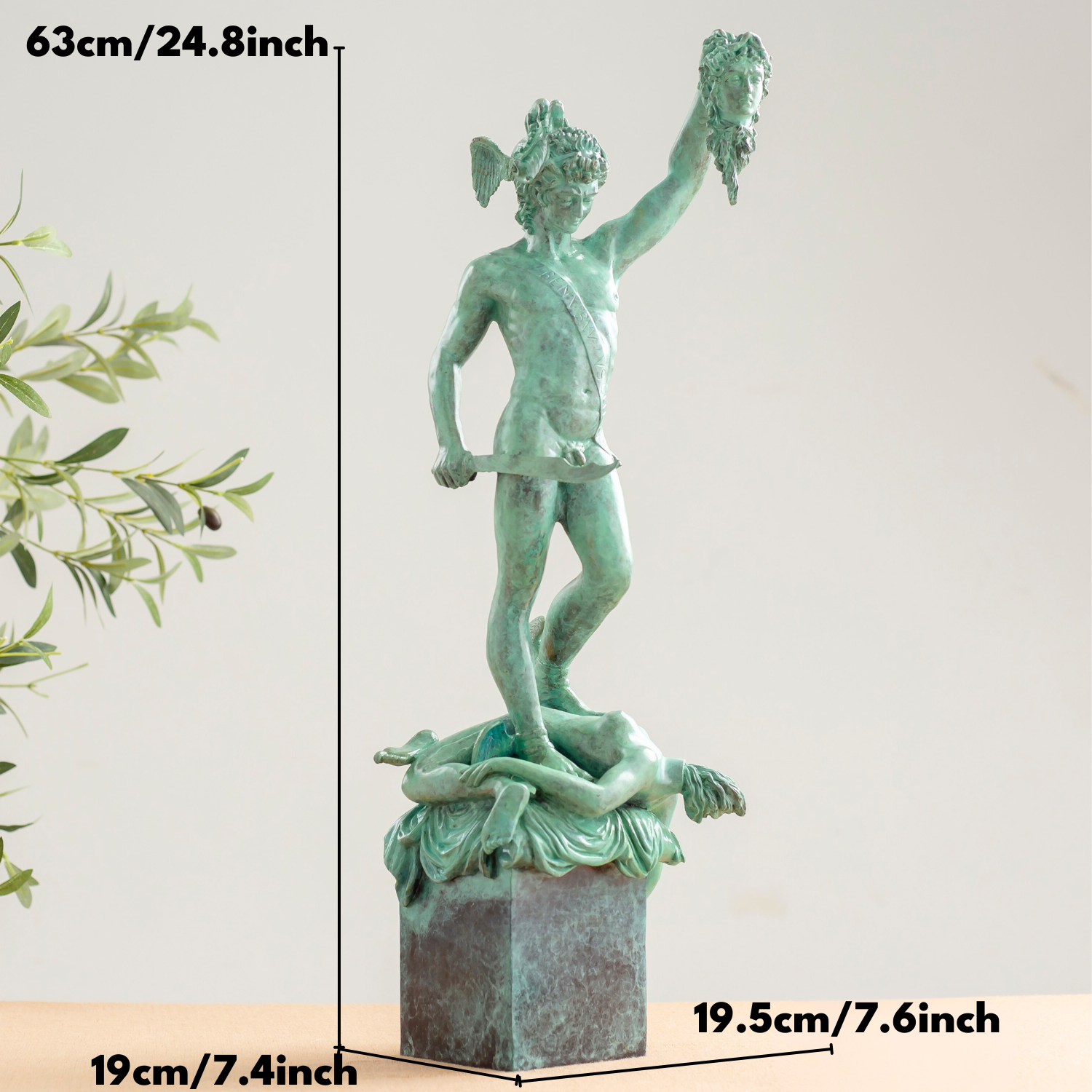 Perseus Medusa verdigris green bronze sculpture as statement home décor beside sofa