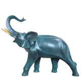 Cerulean blue bronze elephant statue with trunk up front view on white background, hand-cast sculpture
