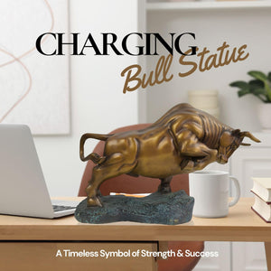 Charging bull sculpture in antique bronze, side angle view.