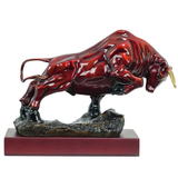12.6-inch red bronze charging bull with wood base, front.